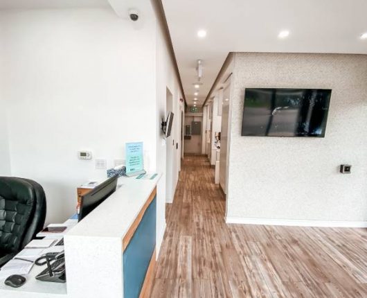 passage way reception area at rusholme family dentistry